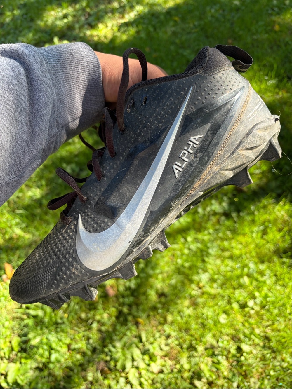 Nike Alpha Men's Black Cleats with Silver Swoosh